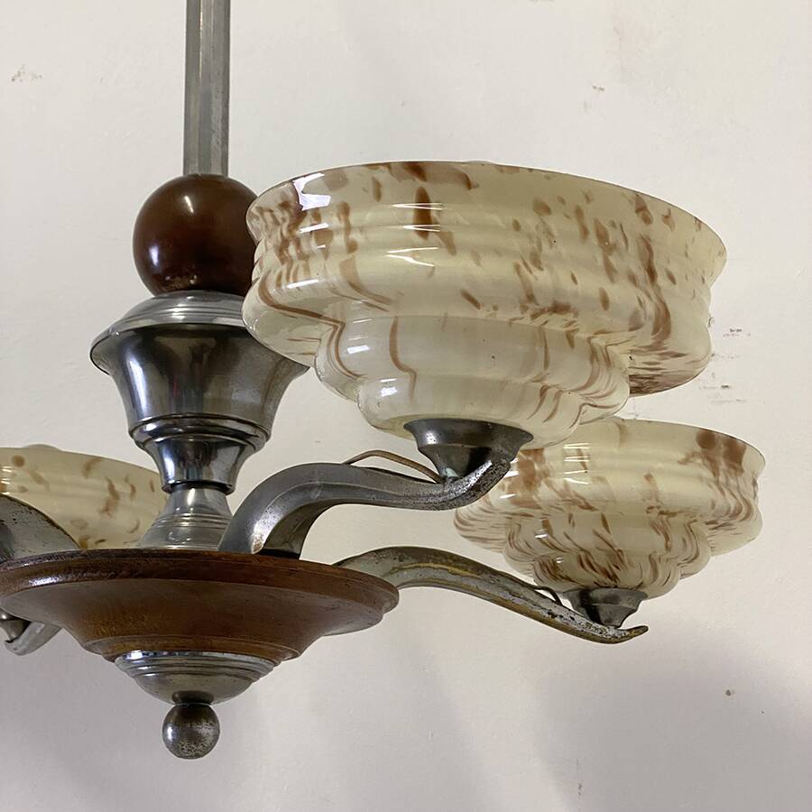 Art Deco chandelier in wood, chrome metal, and glass.