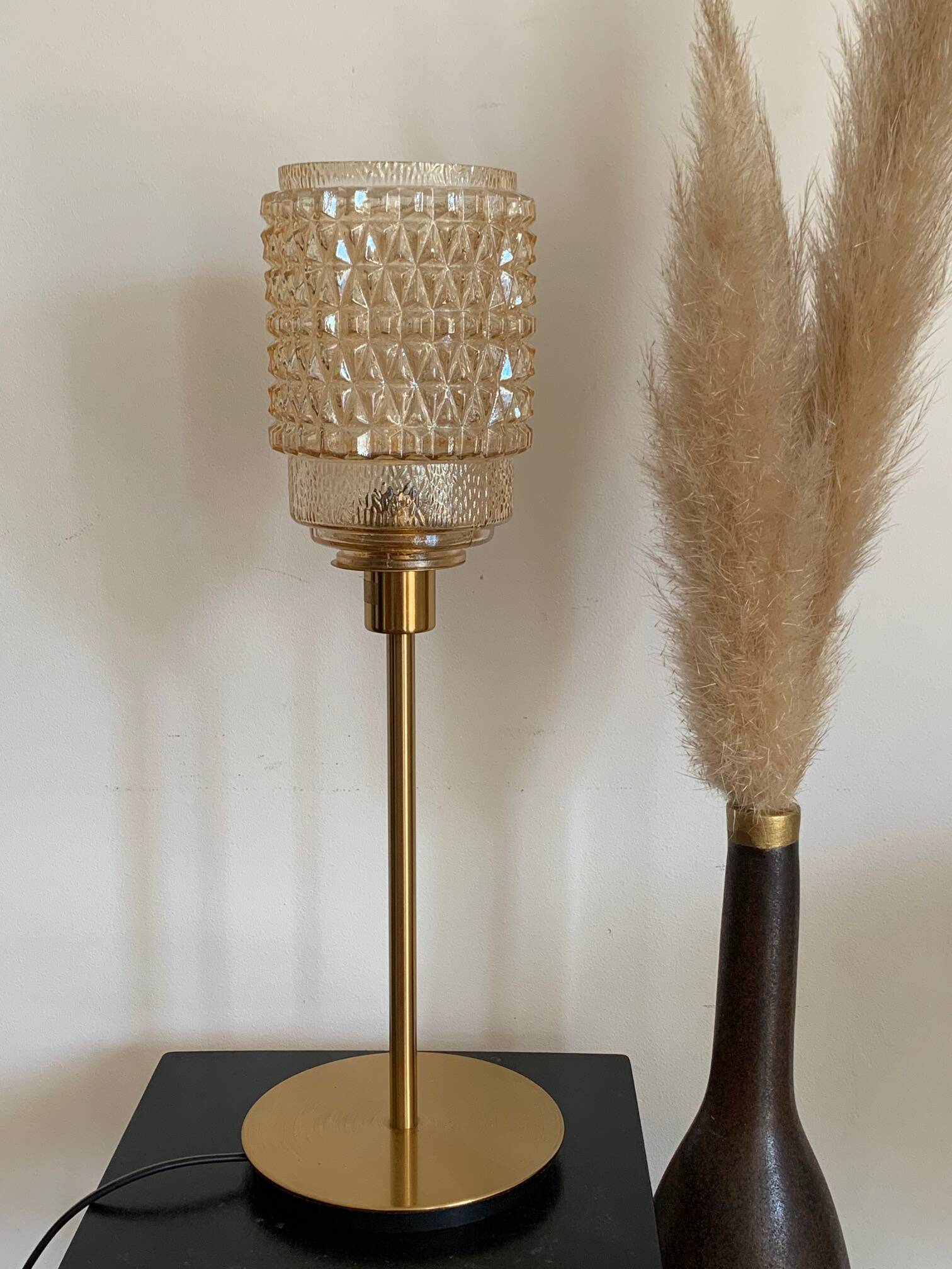 Table lamp made from an old golden glass pendant light