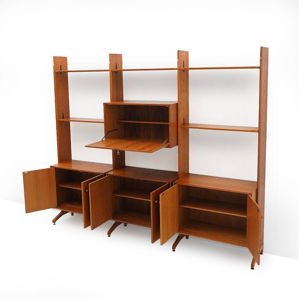 Library with wooden uprights by A.V. Contemporary Furnishings, 1960s.