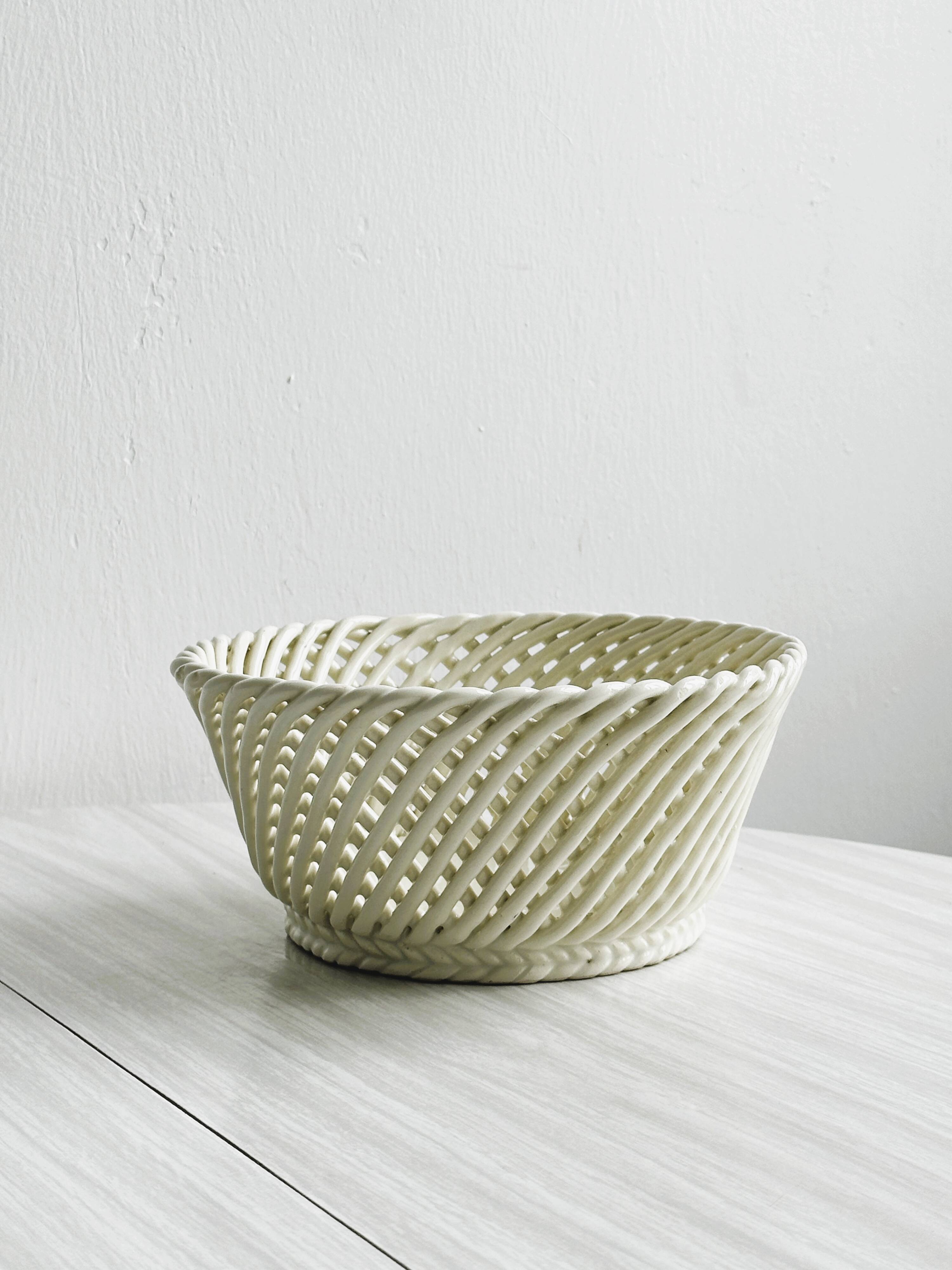 Bread basket - openwork white ceramic bowl.