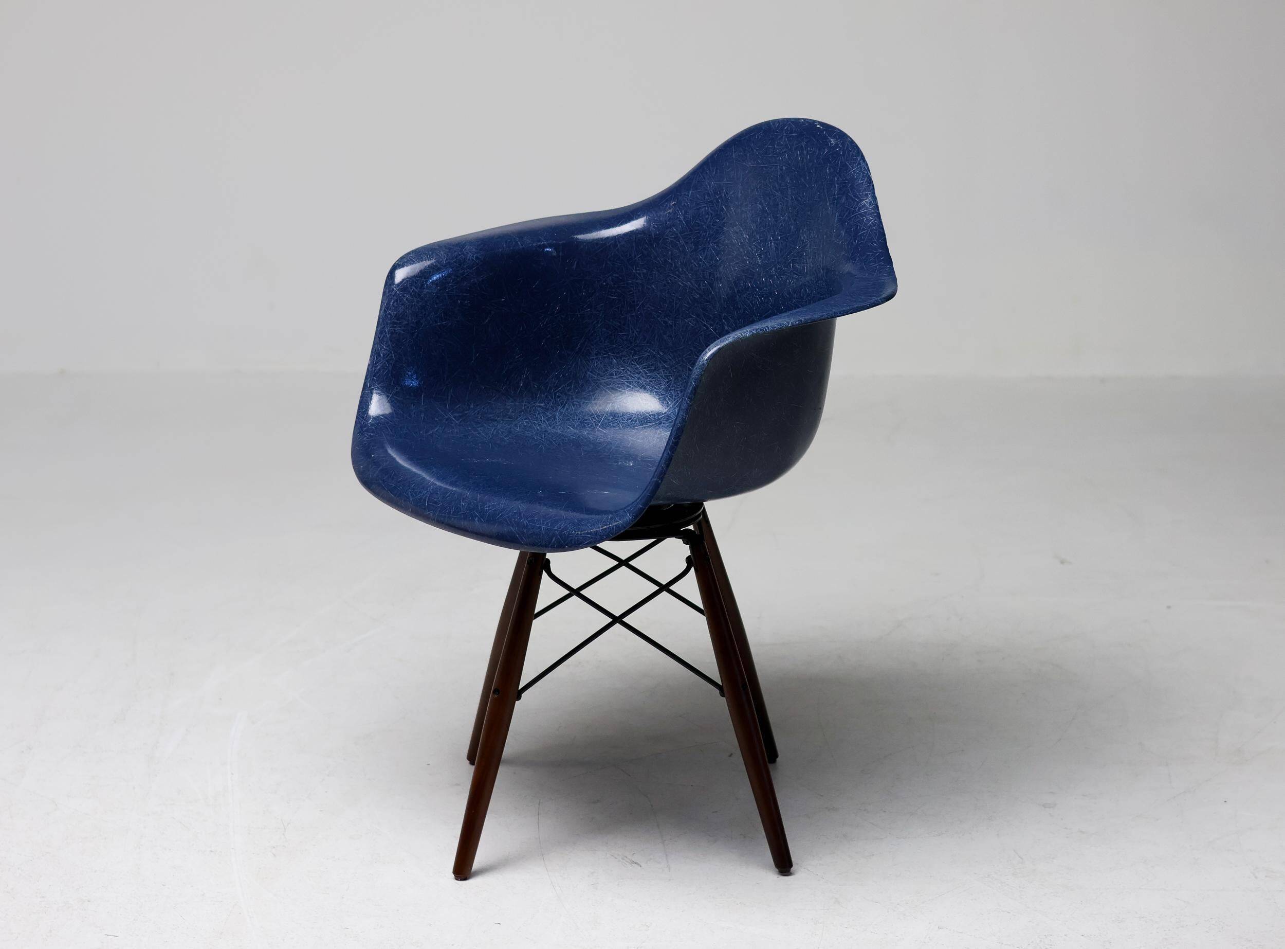 Indigo blue Charles Eames "PAW" armchair by Herman Miller, mid-century modern.