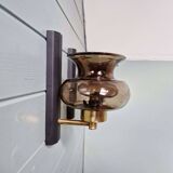 Pair of wall sconces in brass and smoked glass, 1960s.
