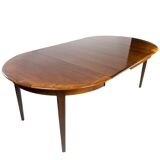 Dining table in rosewood with two extension plates, of danish design from the 1960s.