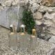 Three bottles of crystal perfume signed Marcel Rochas old france