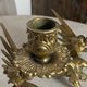 Paire de bougeoirs chimères en bronze