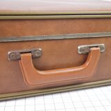 Cardboard and brown leather case