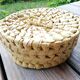 Round palm leaf basket