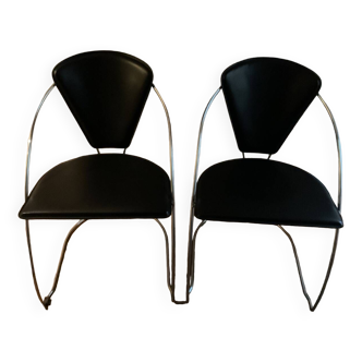 Two vintage steel and leather FIL chairs