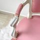 Pink Louis XV style convertible armchair in weathered wood for children