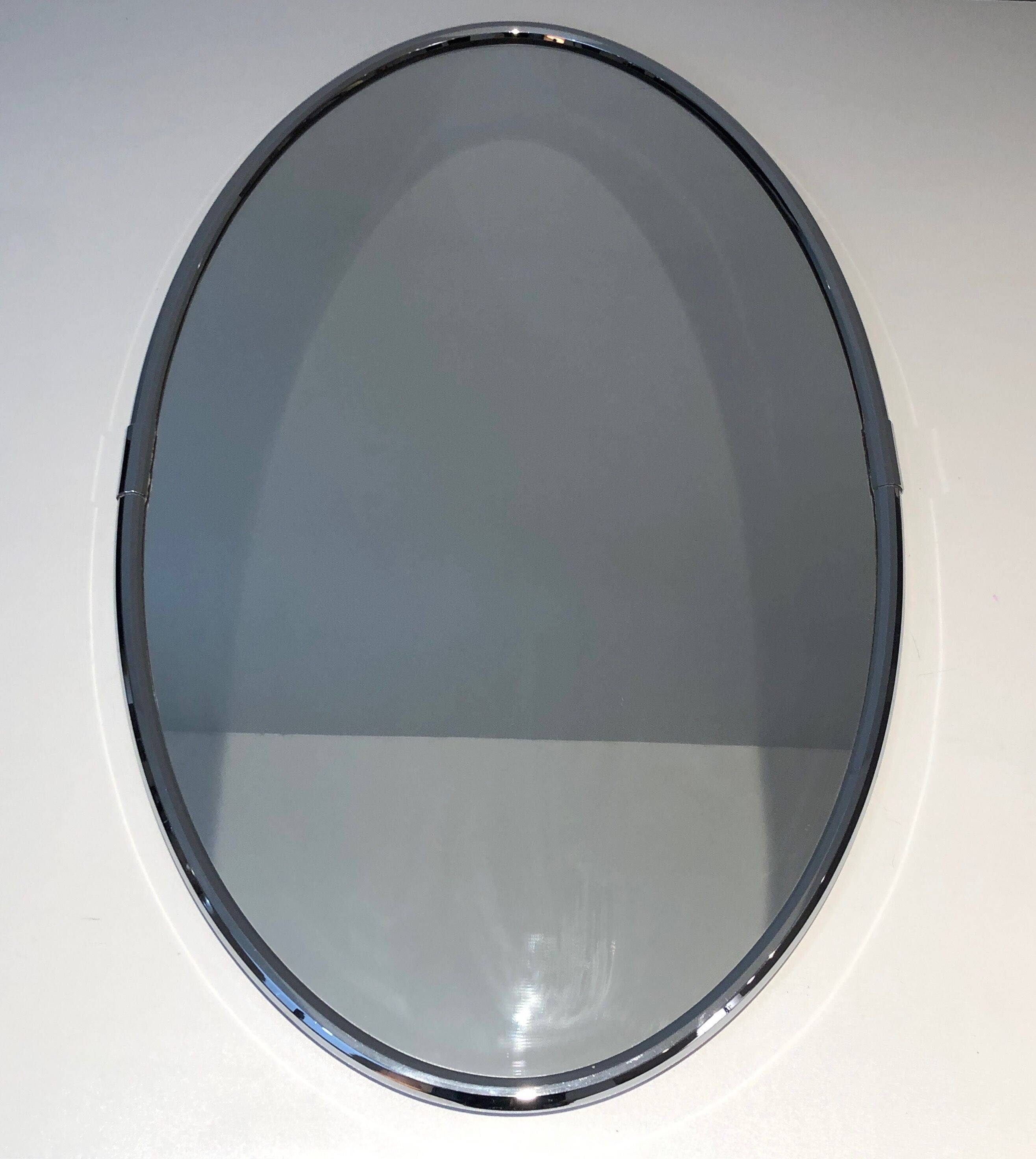 Oval chrome mirror in Art Deco style. Circa 1970.