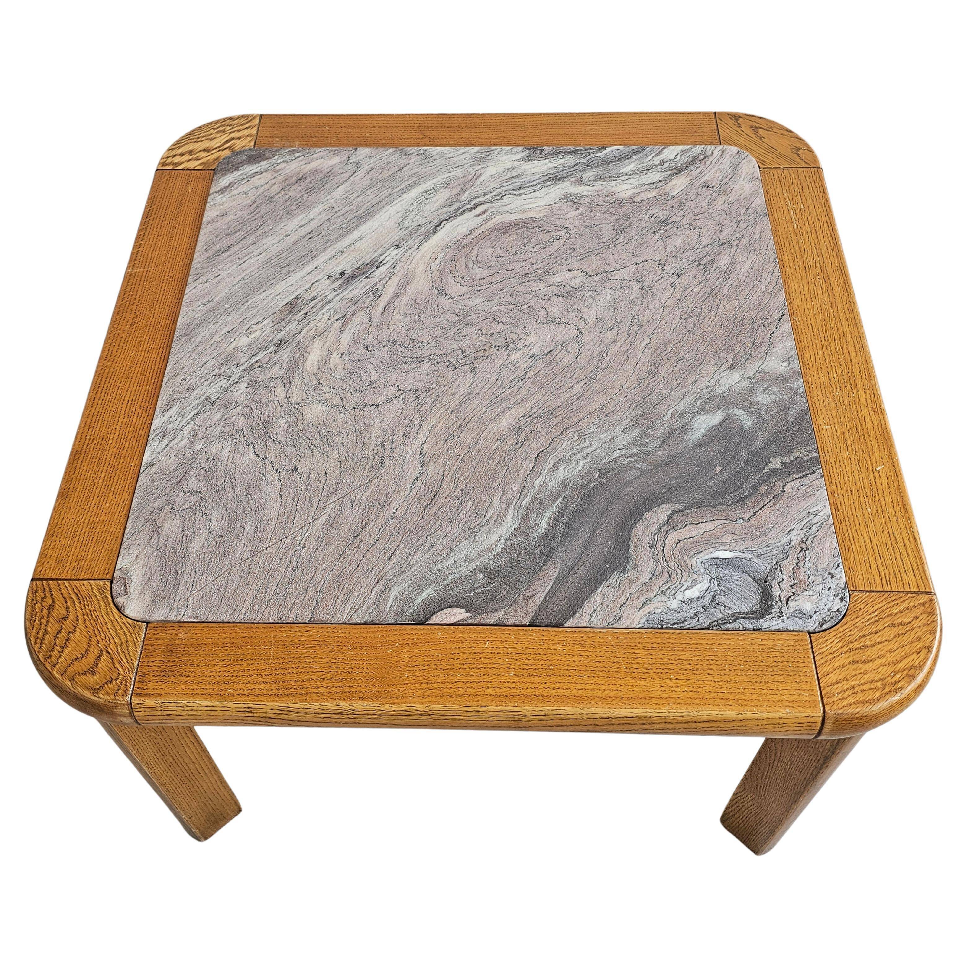 Brutalist coffee table in solid oak with a Rosso Luana marble top.