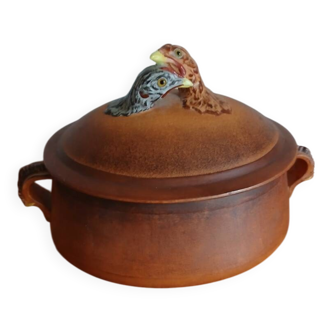 Old terrine with 2 partridges