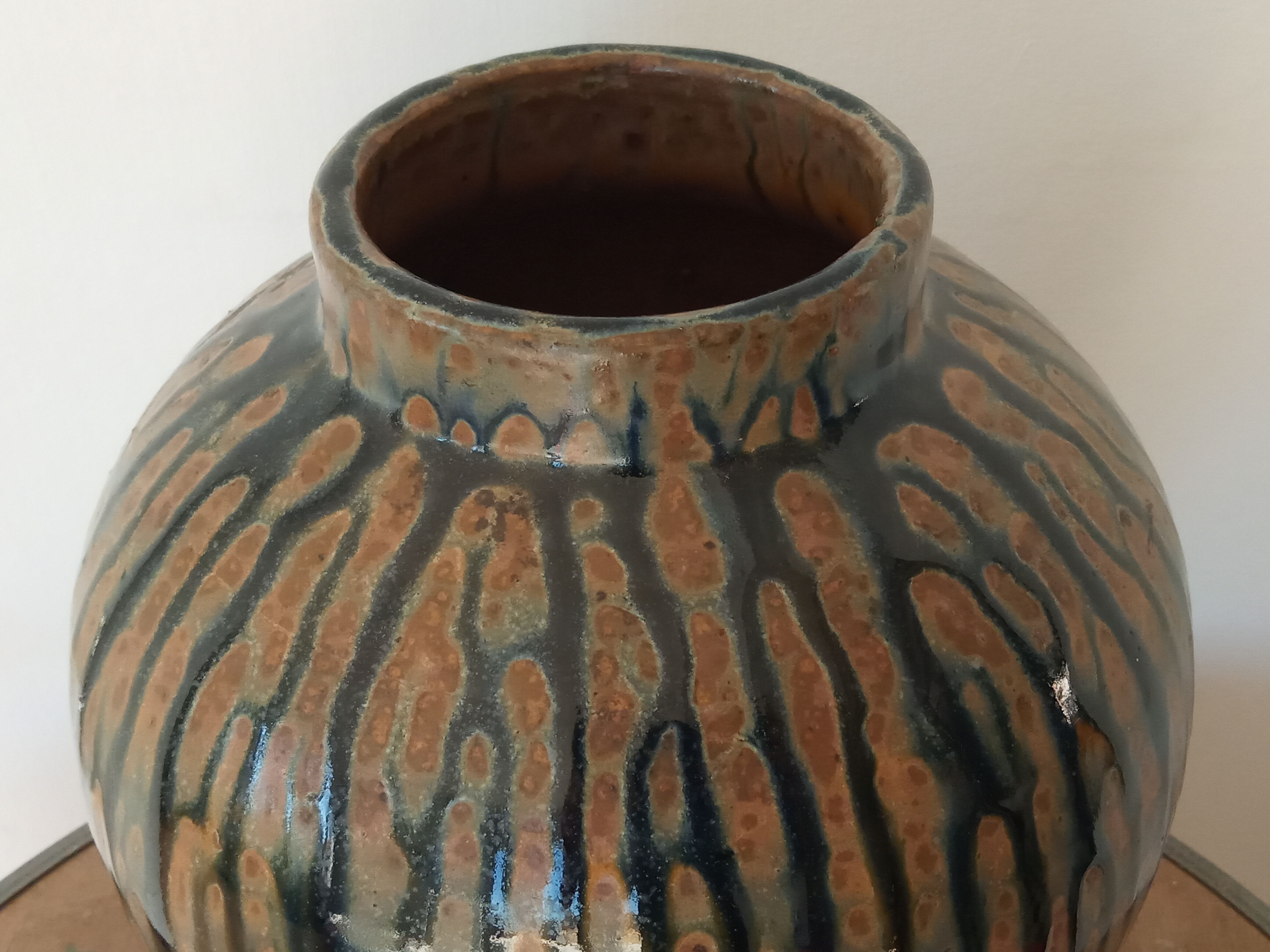 Enamelled sandstone vase
