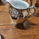 Breakfast set with tea or coffee in porcelain.