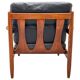 Scandinavian armchair in black leather and teak - 1960s
