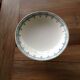 Dish on foot green iron earth diametre 22.5cm