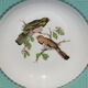 4 vintage hollow plates decorated with birds