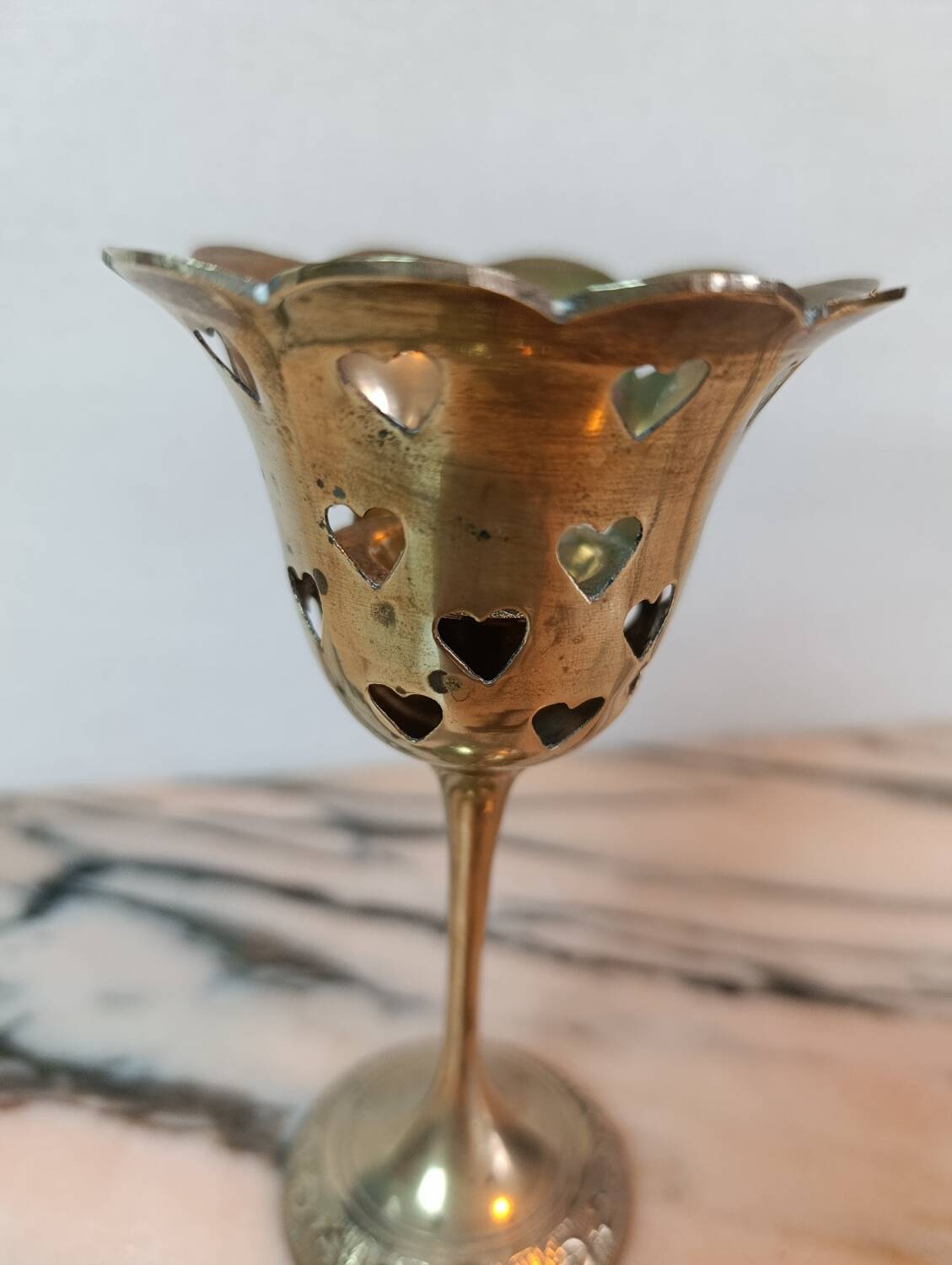 Lattice brass footed lantern with heart pattern