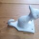 Wall-mounted duck head coat hook in white ceramic, cottagecore style.