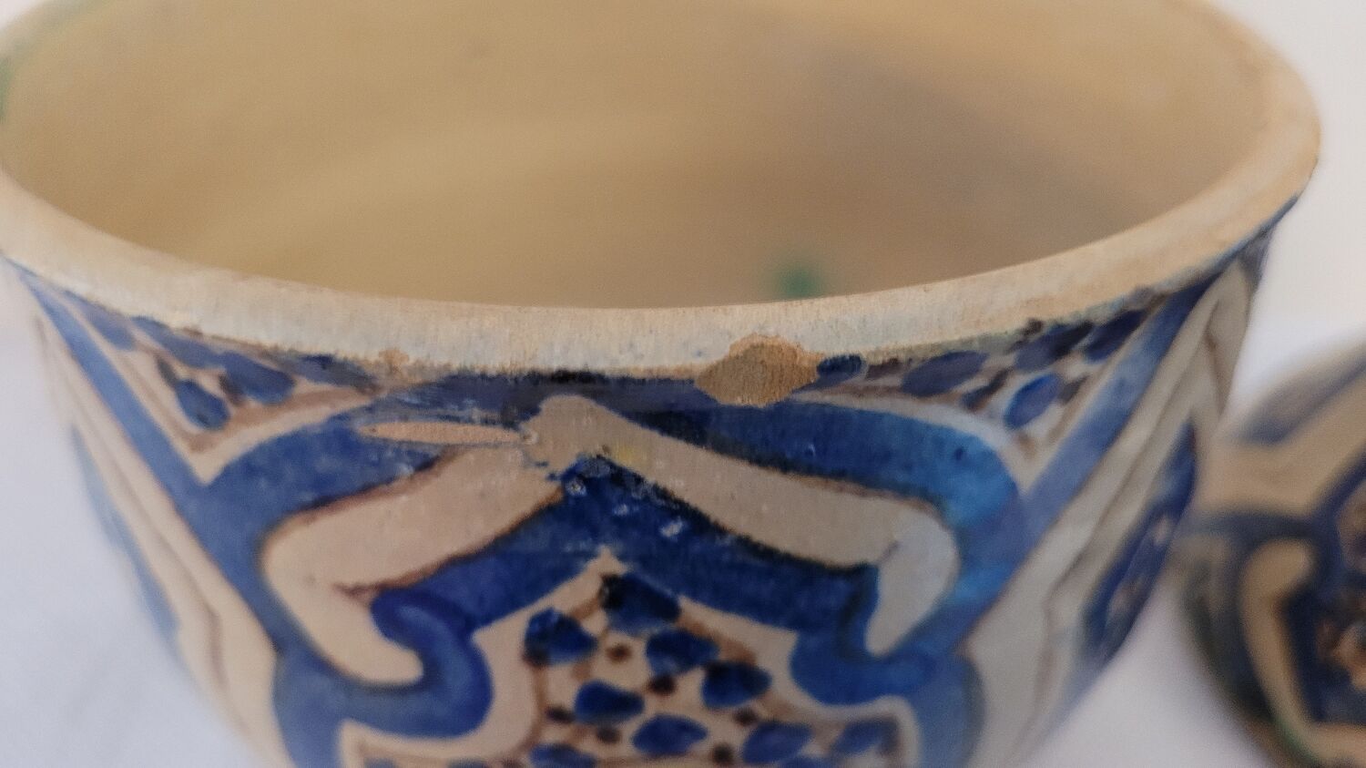 Pot in painted earth