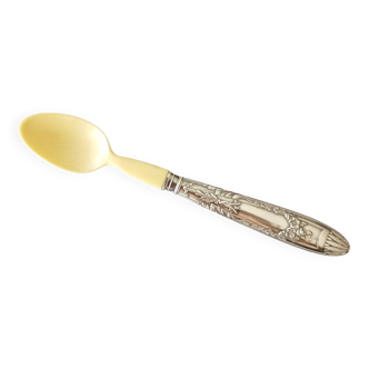 silver-plated baby feeding spoon