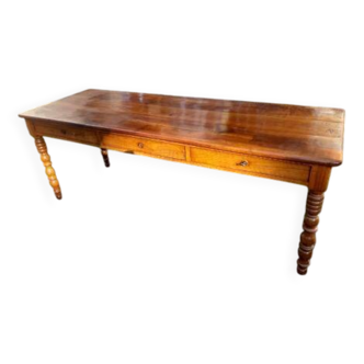 Wooden farmhouse table with turned legs
