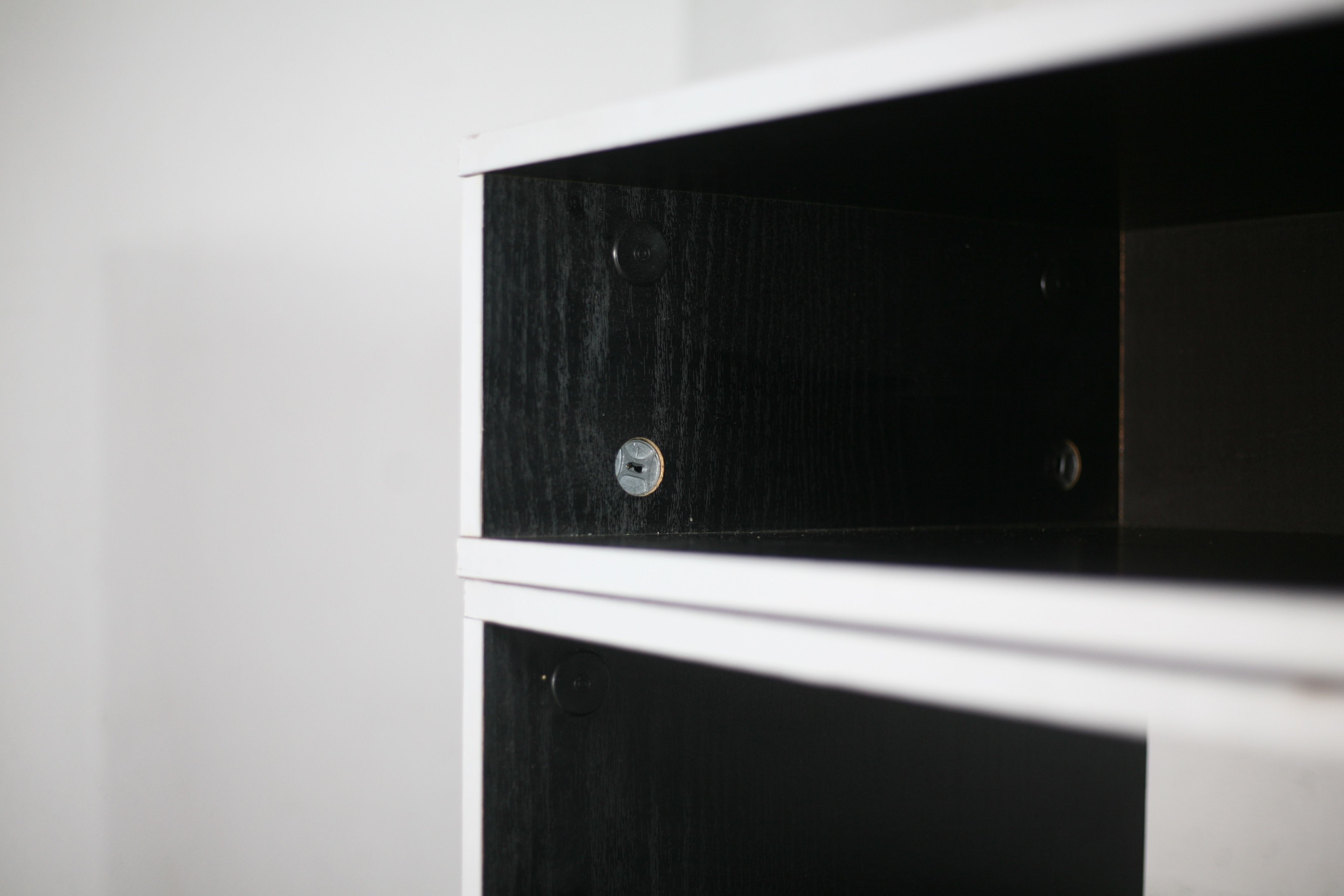 Storage cabinet wood compressed lacquered black lining margins aluminum. France, circa 1975.