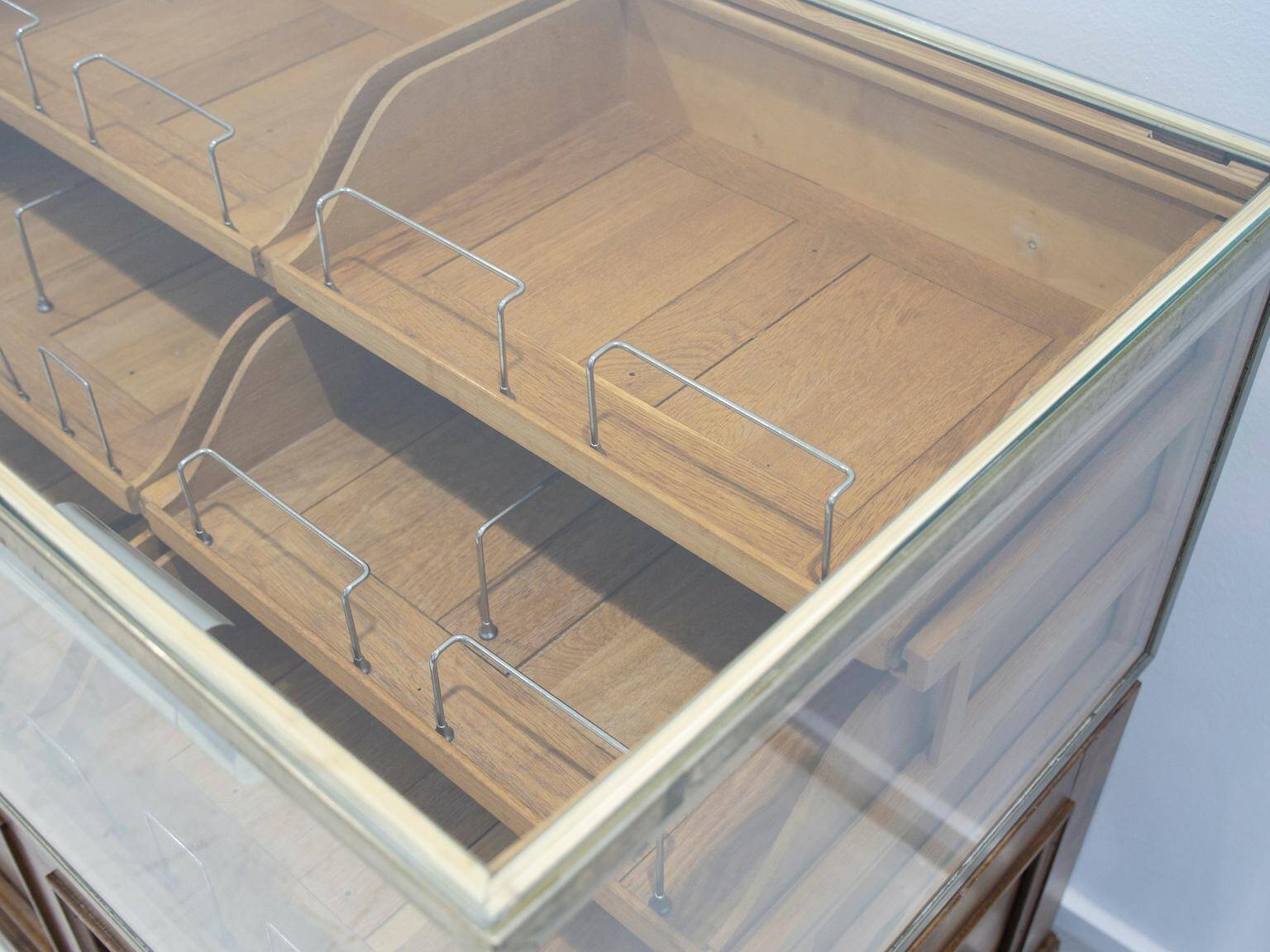 Shop counter made of birch and oak with twenty drawers, 1940s.