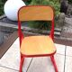 Children's wooden and red metal chair 1970