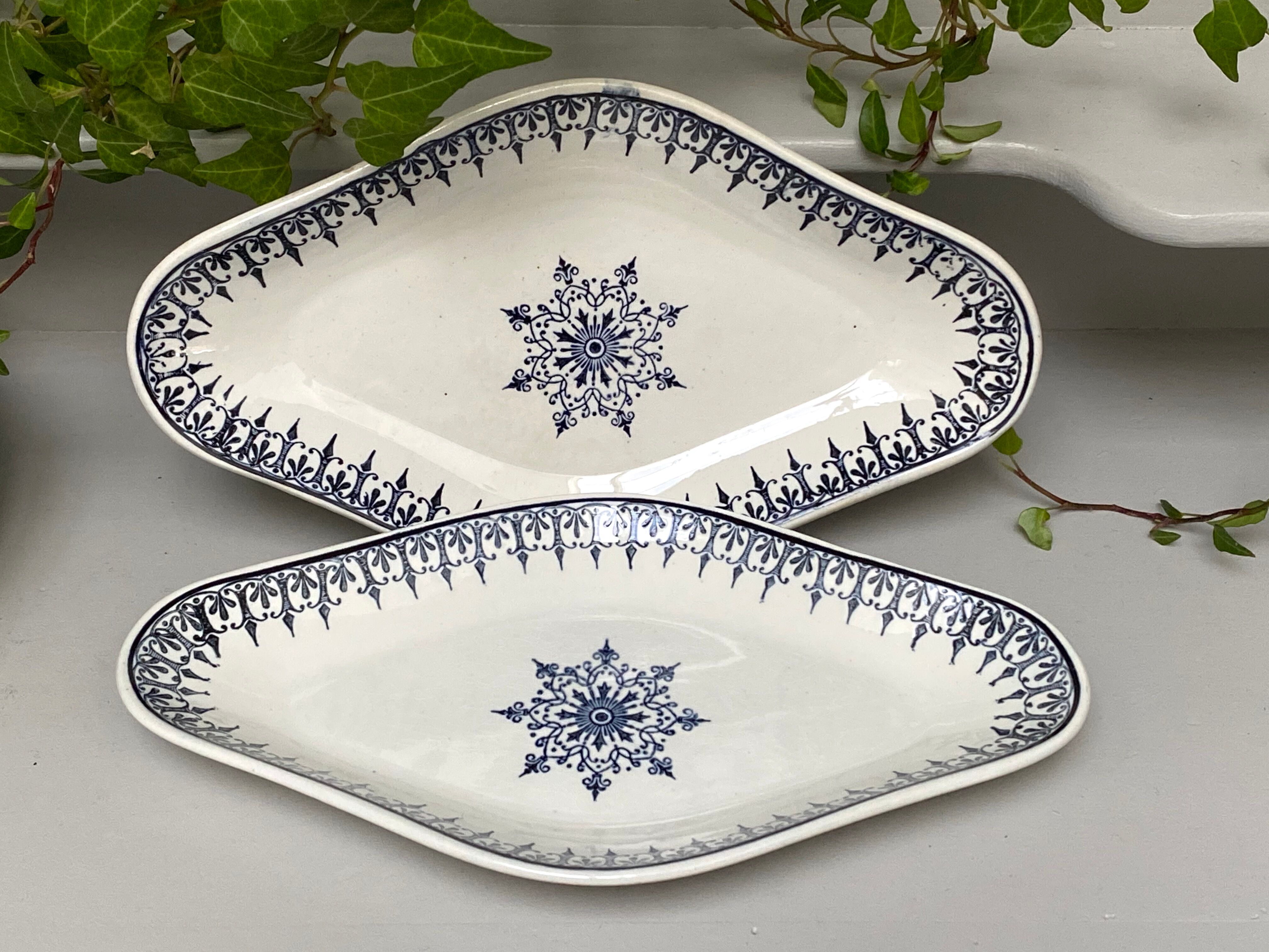 Pairs of old dishes St Amand