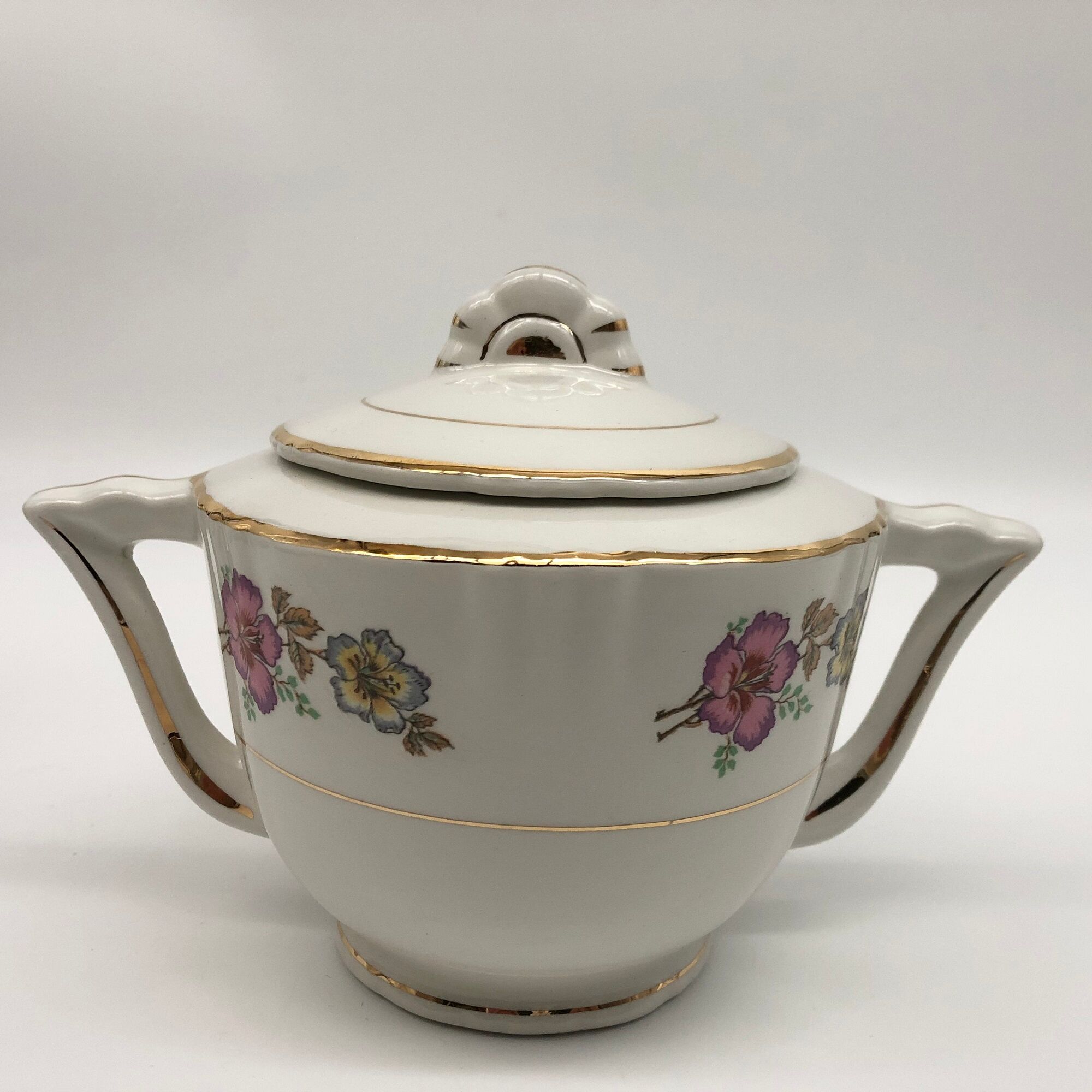 Coffee service 6 cups with saucers, sugar bowl and creamer.