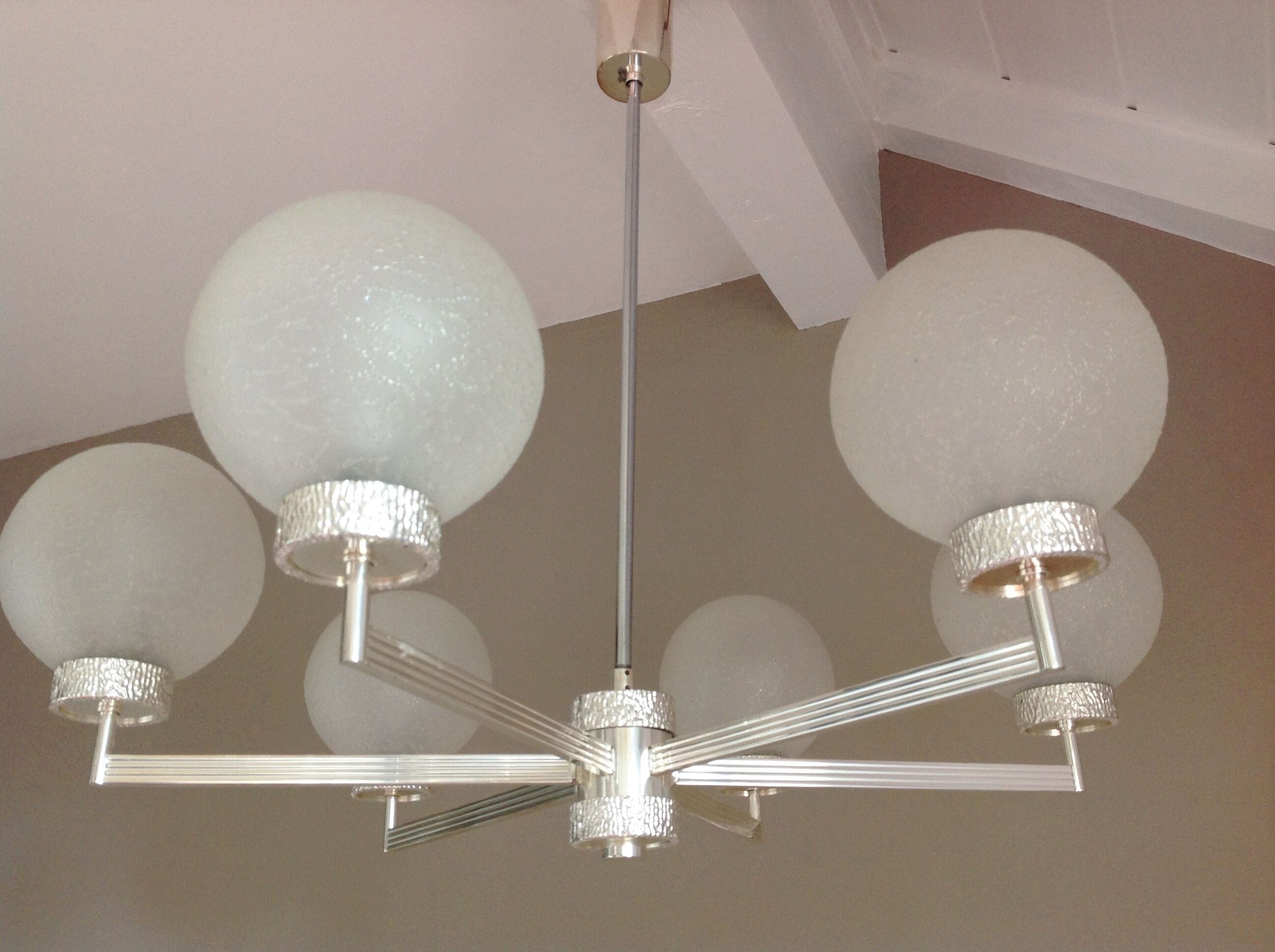 Six-light chrome metal chandelier and opaque glass globes / vintage 60s and 70s