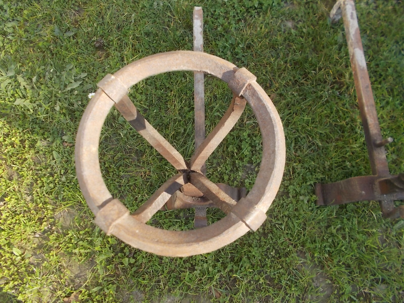 Pair of wrought iron fire dogs