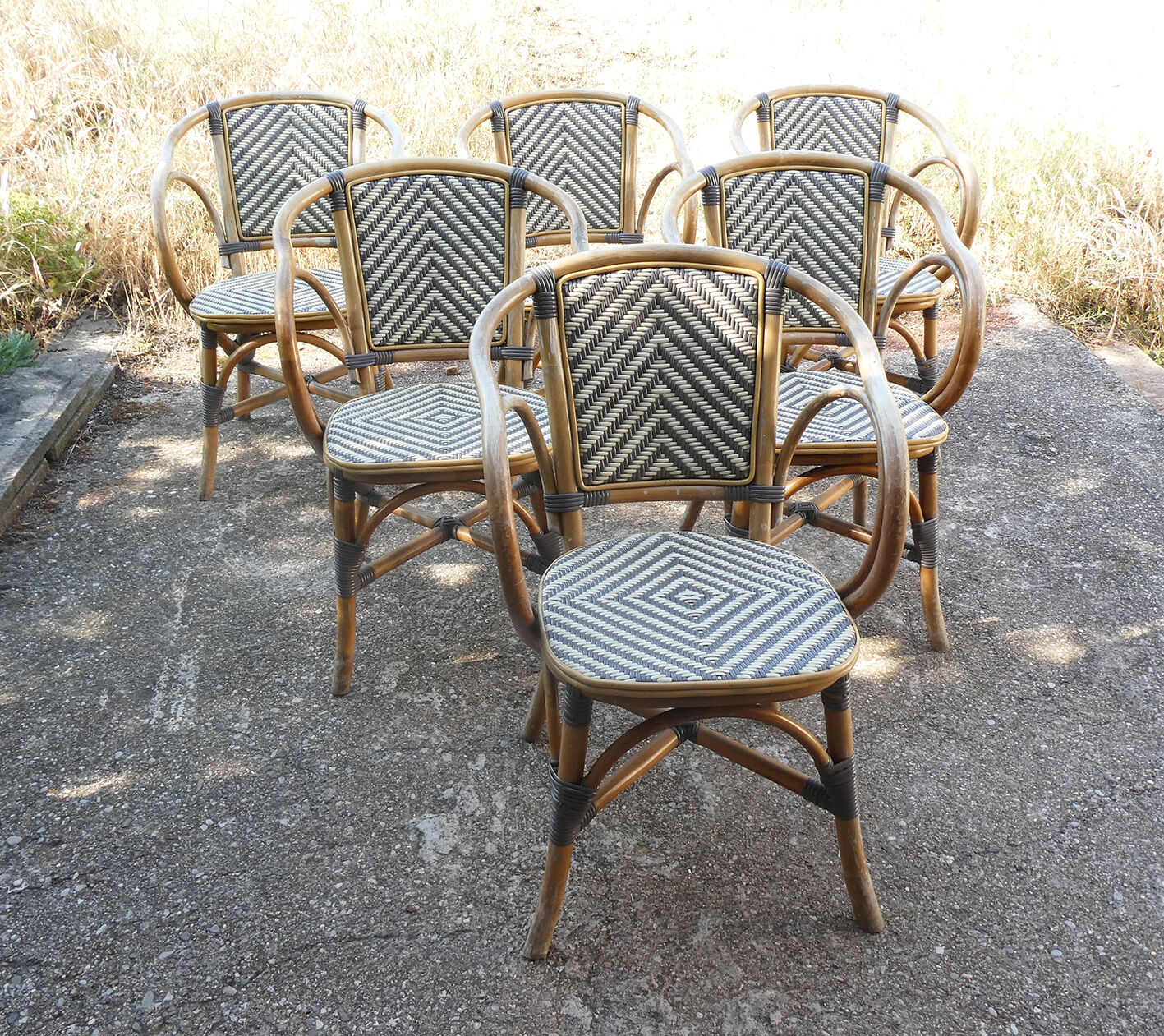 Ensemble de 6 fauteuils bistrot de terrasse en rotin type "parisienne".