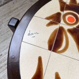 Round ceramic coffee table with “rooster” motif by Dan