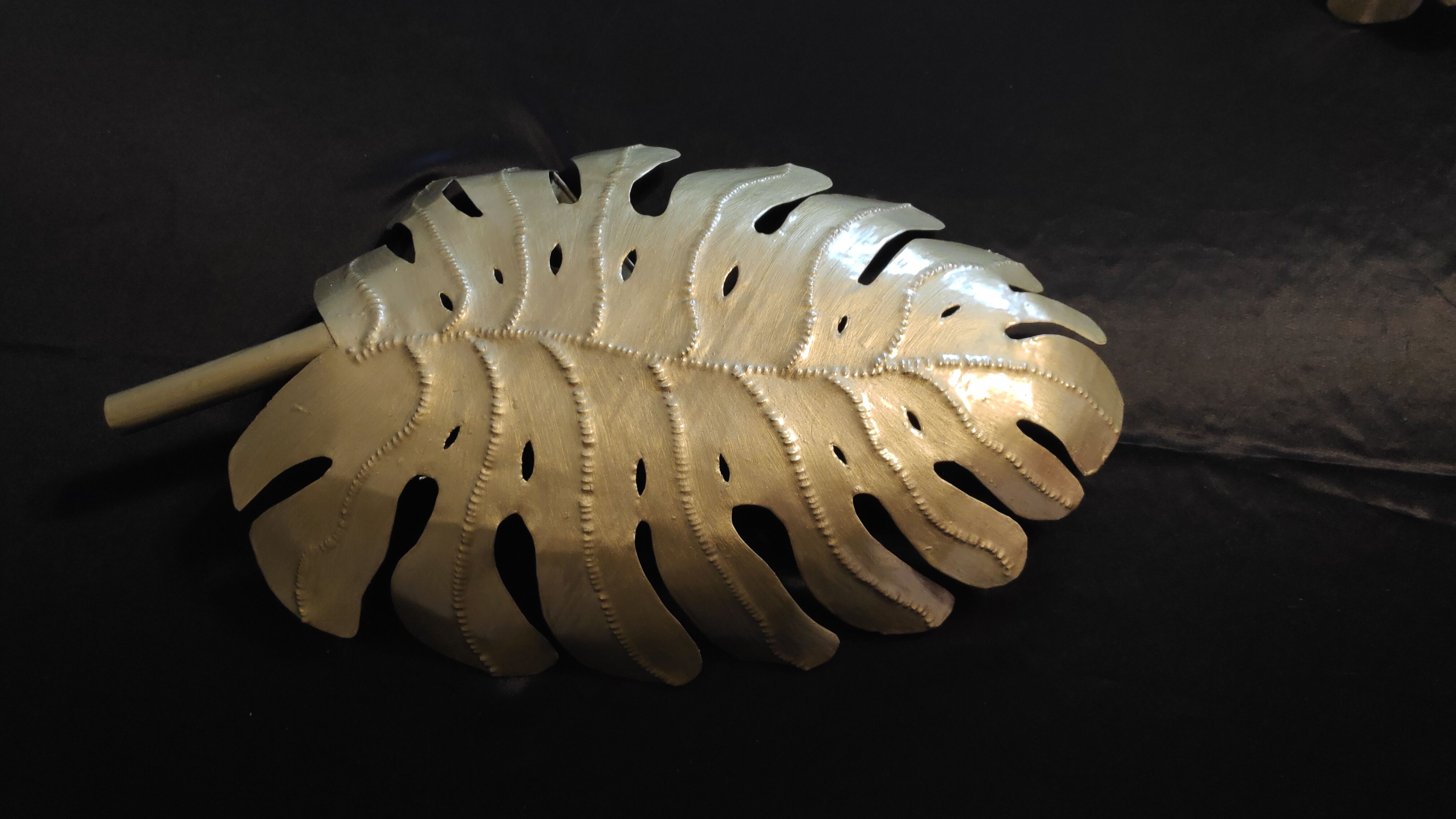 Pair of hammered gold metal wall lamps