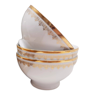 Trio of white and gold porcelain bowls