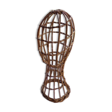 Old bust head in wicker