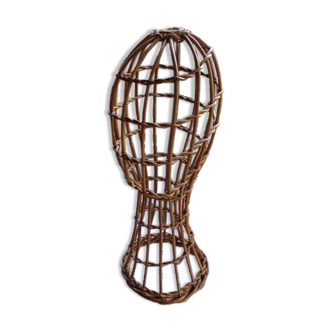 Old bust head in wicker