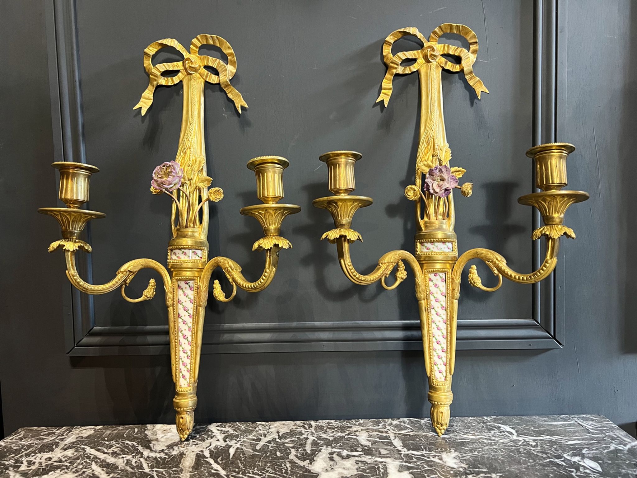 Pair of nineteenth century sconces in bronze and porcelain
