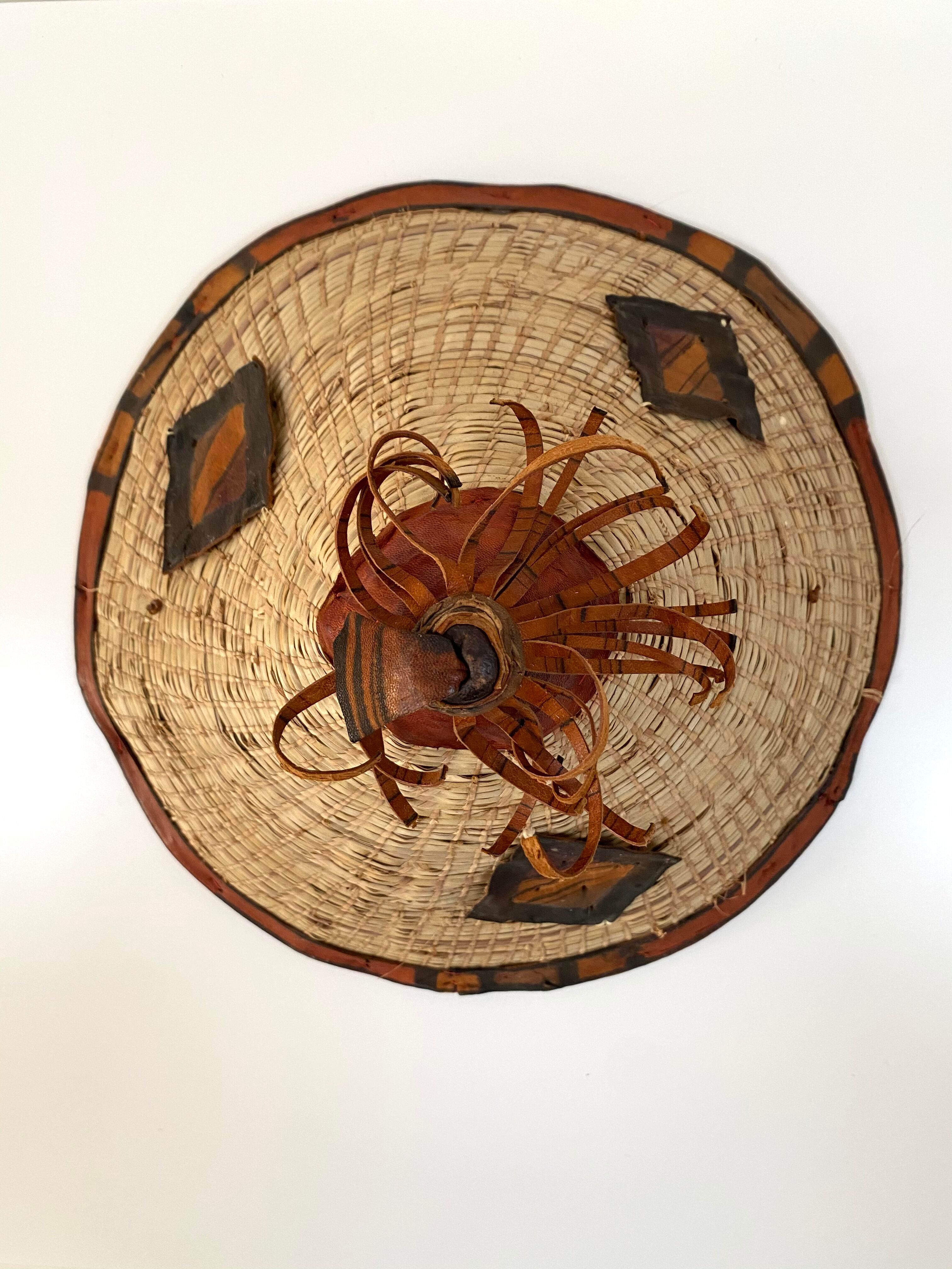 Traditional African Fulani hat in leather and woven straw