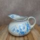 Small antique ironstone jug L.m Creil and Montereau with blue floral decoration.