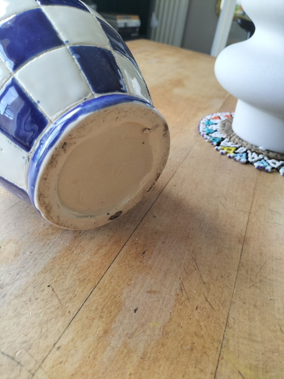 Blue and white checkerboard water pitcher