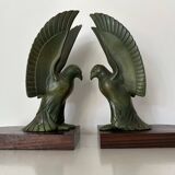Pair of eagle bookends in green patina regula with rosewood base