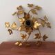 Applique murale feuilles fleurs en métal doré