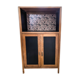 Art Deco style buffet with hydrangea flowers in the background