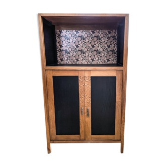 Art Deco style buffet with hydrangea flowers in the background