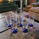 7 faceted champagne flutes – cobalt blue stem – 1970s