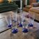 7 faceted champagne flutes – cobalt blue stem – 1970s