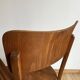 Wooden armchair with armrests